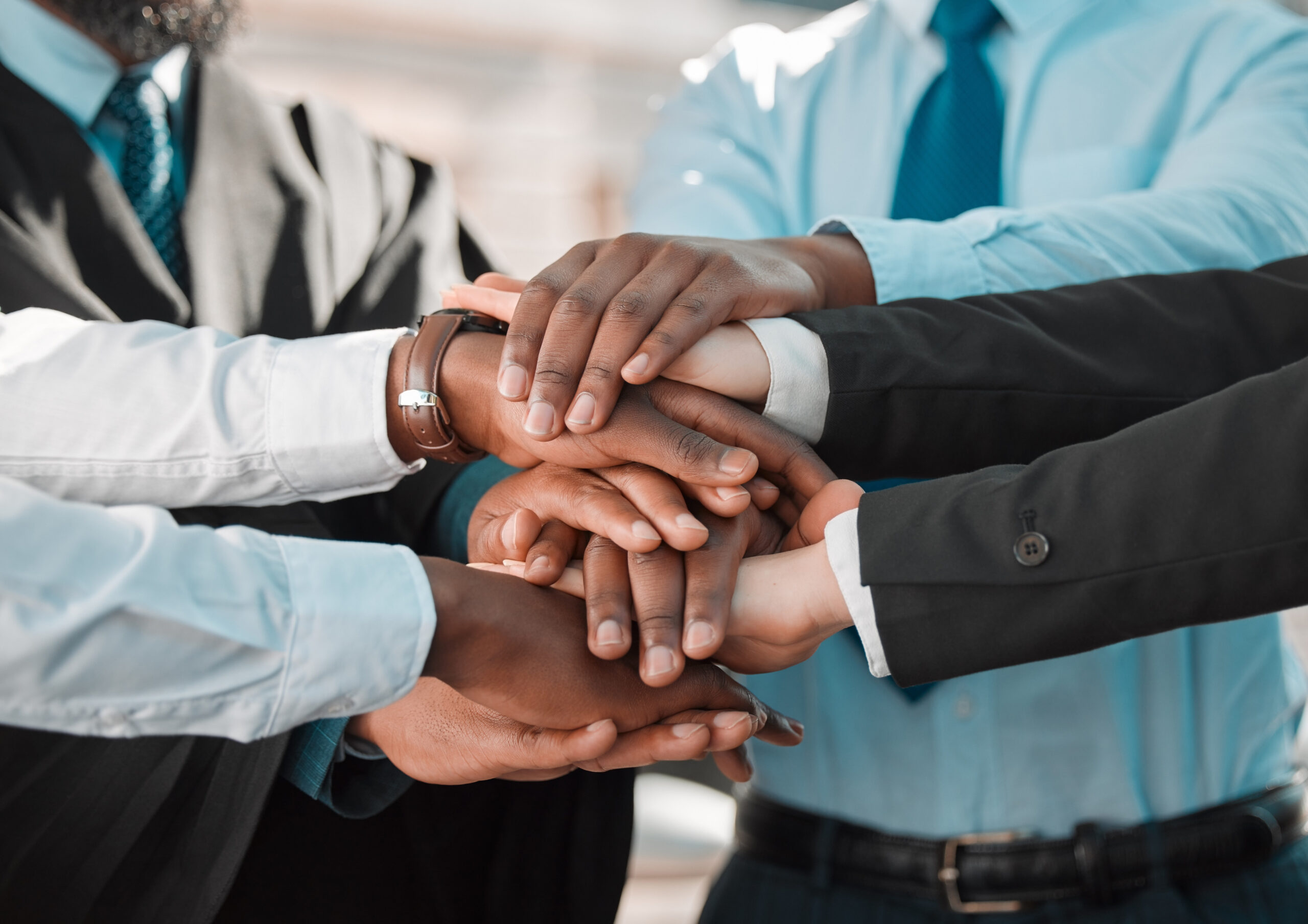 business employees pile hands support with teamwork collaboration commitment people partnership huddle motivation trust unity solidarity project with coworking